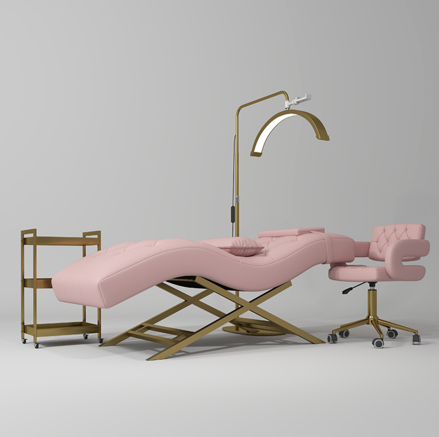 Pink massage table with gold frame and chair on a gray background