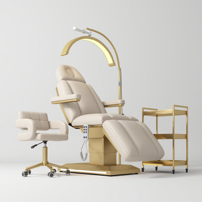 Beige medical examination chair with a lamp on a white background