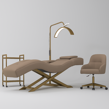 Beige massage table with a lamp and chair on a white background